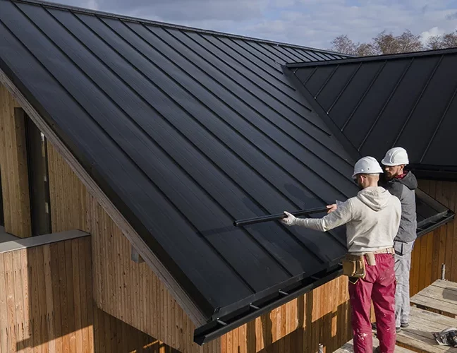Full Shot Roofers Working Together With Helmets